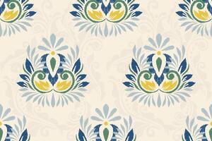 ikat floral cachemir bordado en blanco fondo.ikat étnico oriental sin costura modelo tradicional.azteca estilo resumen vector ilustración.diseño para textura,tela,ropa,envoltura,decoración.