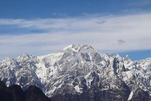 Very beautiful view of the snow-capped mountains in Auli Ukkarakhand India photo