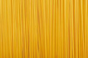 top view of raw spaghetti seamless background pattern photo