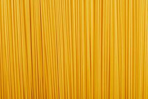 top view of raw spaghetti seamless background pattern photo