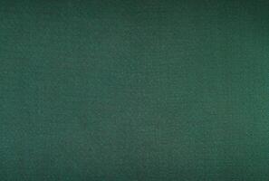 abstract festive dark fabric green background photo