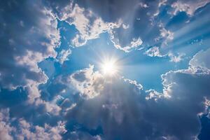 blue sky with clouds and sun shines photo