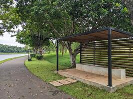 Shelter for mini bus on the garden and harbours. The photo is suitable to use for transportation content media and transportation advertising.