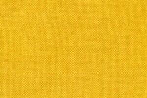 Yellow fabric cloth texture background, seamless pattern of natural textile. photo