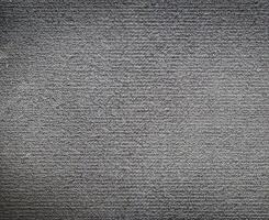 Background texture of rough black carpet. photo
