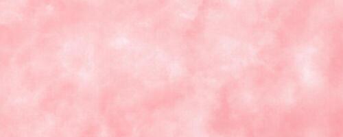 An illustration of a watercolor background in a soft pink hue, providing a textured appearance suitable for design purposes. photo