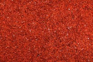 Background texture of chili powder and red cayenne pepper. photo