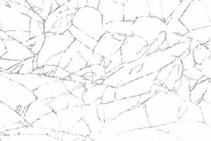 The background of the mobile phone is textured with broken glass. photo