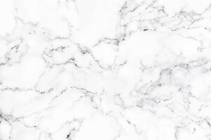 The luxurious texture and backdrop of white marble are ideal for artistic patterns and decorative designs. High-resolution marble photo