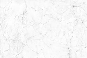 High-resolution background of white, gray marble texture with a seamless glitter pattern on a countertop featuring natural tiles that exude luxury. photo