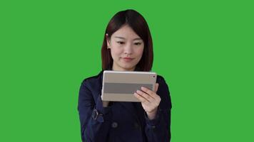 Lifestyle Portrait of Chinese Female Person against Green Background video