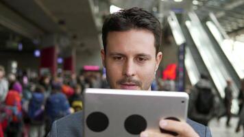 Businessman Networking on Mobile Tablet Device in the City video