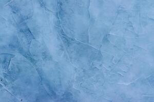 glacial elegancia, agrietado hielo textura para un invierno antecedentes foto