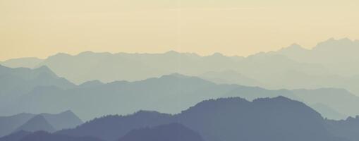 Silhouetted Majesty, A Majestic Evening Over the Mountain Peaks photo