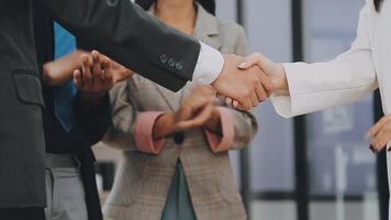 Business handshake for teamwork of business merger and acquisition,successful negotiate,hand shake,two businessman shake hand with partner to celebration partnership and business deal concept video
