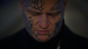 Unconventional Young Man Covered in Tattoos and Dark Black Clothes video