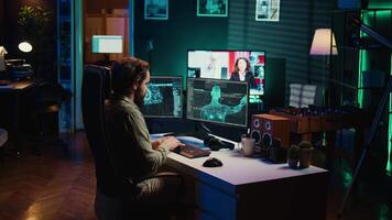 Hacker uploading evolved sentient AI to disk, planning to use it for evil mastermind plan. Rogue programmer putting malware infected artificial intelligence bot in cartridge, camera B video