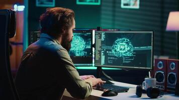 Happy programmer celebrating after managing to make AI become sentient and ask questions about itself. Ecstatic developer punching desk in excitement after achieving AI singularity, camera A video
