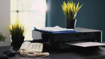 Paperwork on office desk containing financial information required for tax return preparation, close up shot. Company documents on table in accounting department workspace video