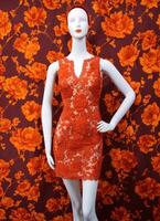 AI generated Fashionable evening orange summer dress on a mannequin. ai generative. ai generative photo