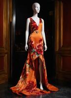 AI generated Fashionable evening orange summer dress on a mannequin. ai generative. ai generative photo