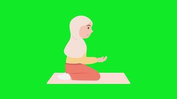 musulmán niña sentado en el piso y meditando video