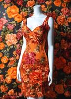 AI generated Fashionable evening orange summer dress on a mannequin. ai generative. ai generative photo