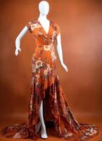 AI generated Fashionable evening orange summer dress on a mannequin. ai generative. ai generative photo