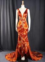 AI generated Fashionable evening orange summer dress on a mannequin. ai generative. ai generative photo