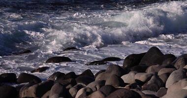 A slow motion of wave at the coast sunny day telephoto shot video