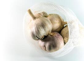 Garlics on white background, food ingredient photo