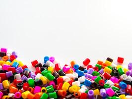 Texture of multicolor beads, colorful background photo