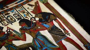 egyptisk papyrus med faraoner och hieroglyphics representation av roterande video