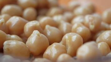 Boiled chickpeas in a bowl closeup video