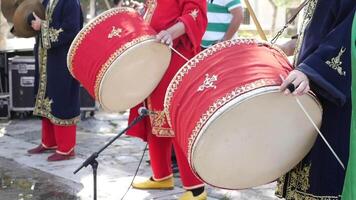 A man hit the ancient drum with Musical Instrument. video
