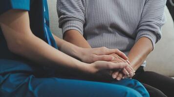 Emotional comfort stored in fingerprints. Shot of an unrecognizable doctor holding hands with her patient during a consultation. video