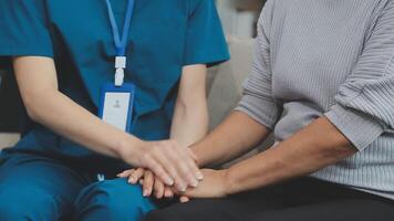 Emotional comfort stored in fingerprints. Shot of an unrecognizable doctor holding hands with her patient during a consultation. video