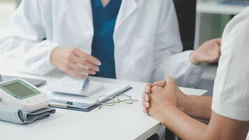 Emotional comfort stored in fingerprints. Shot of an unrecognizable doctor holding hands with her patient during a consultation. video