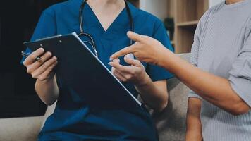 close up doctor, Asian doctor talk with old female patient about disease symptom, doctor use stethoscope listening lung of patient, elderly health check up, happiness hospital video