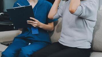 close up doctor, Asian doctor talk with old female patient about disease symptom, doctor use stethoscope listening lung of patient, elderly health check up, happiness hospital video