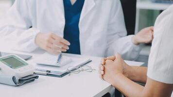 Emotional comfort stored in fingerprints. Shot of an unrecognizable doctor holding hands with her patient during a consultation. video