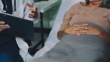 Emotional comfort stored in fingerprints. Shot of an unrecognizable doctor holding hands with her patient during a consultation. video