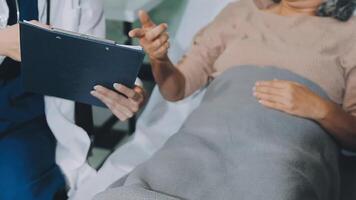 Emotional comfort stored in fingerprints. Shot of an unrecognizable doctor holding hands with her patient during a consultation. video