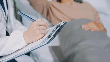 Emotional comfort stored in fingerprints. Shot of an unrecognizable doctor holding hands with her patient during a consultation. video