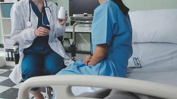 Doctor and patient discussing something while sitting at the table . Medicine and health care concept. Doctor and patient video