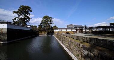 The gate of Odawara castle in Kanagawa sunny day wide shot panning video