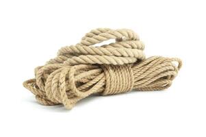 Jute ropes and twines isolated on white background photo