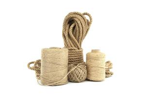 Jute ropes and twines isolated on white background photo