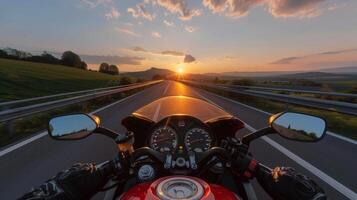 ai generado motociclista s punto de ver exceso de velocidad en autopista a atardecer, emocionante motocicleta paseo foto