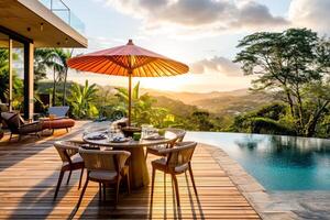 AI Generated A luxurious poolside dining area with a stunning sunset view over a lush landscape. Copy space photo